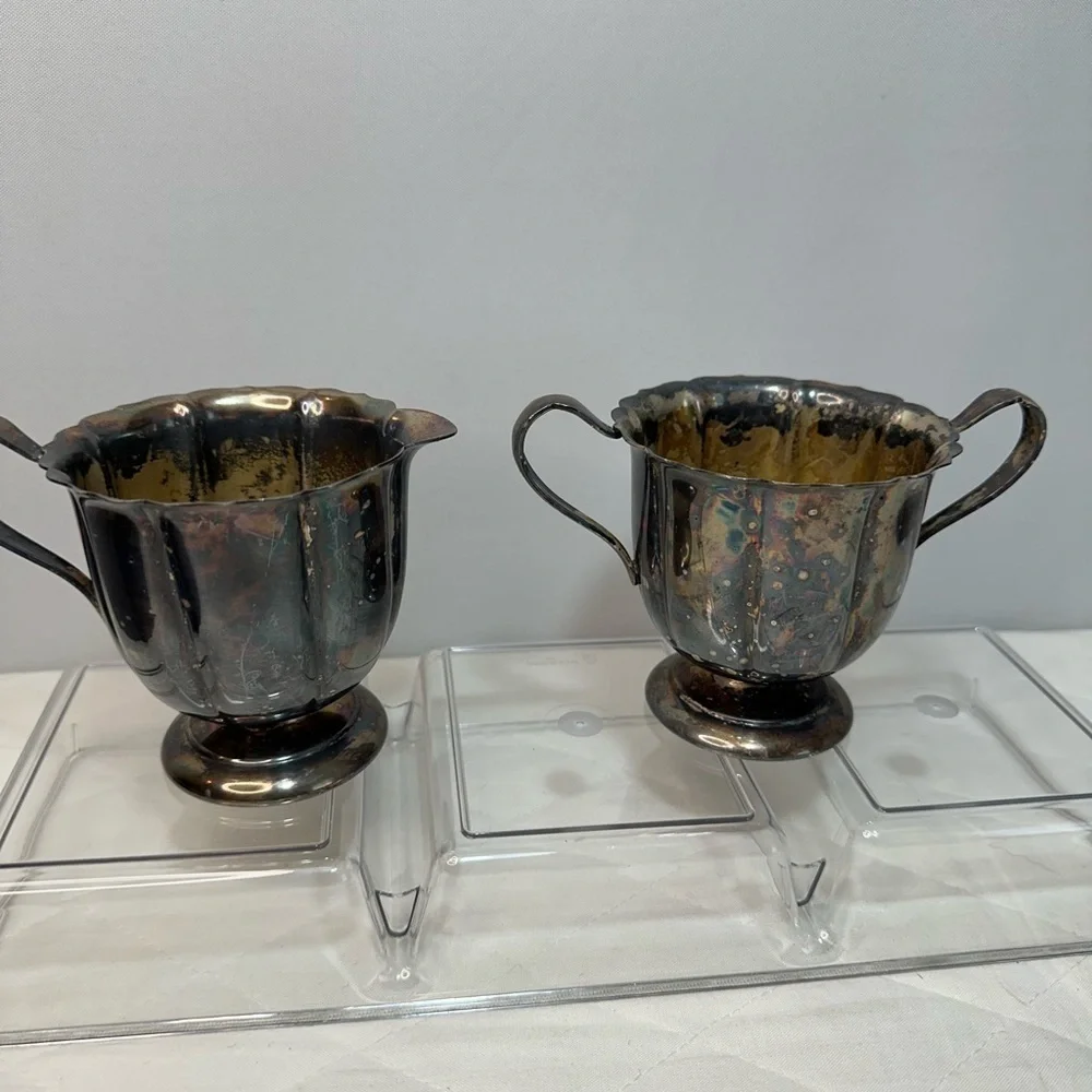 I gave Early American International Company Sugar And Cream Set Silver Plated